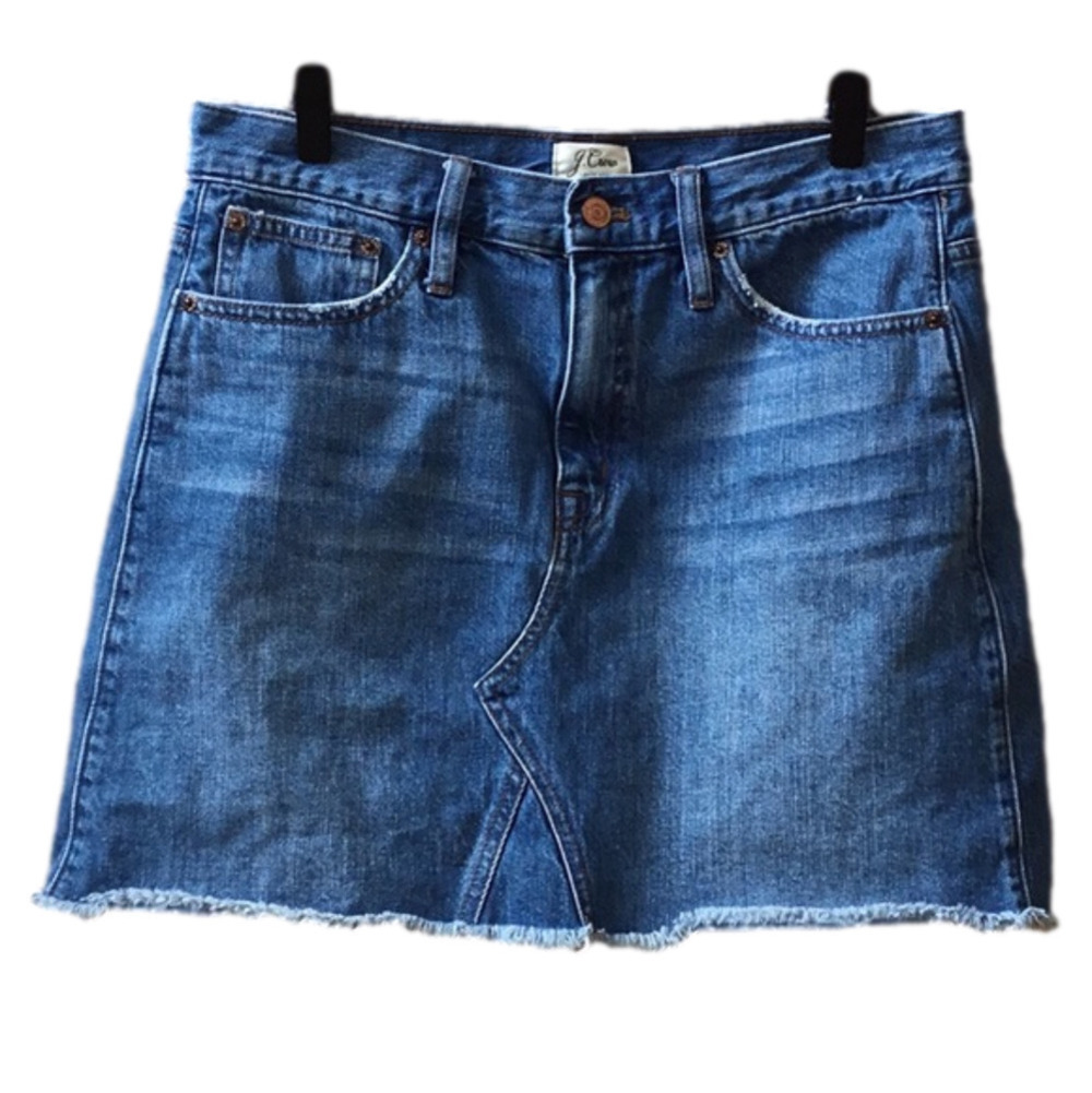 J Crew medium wash, distressed denim blue jean skirt. Women’s size 29